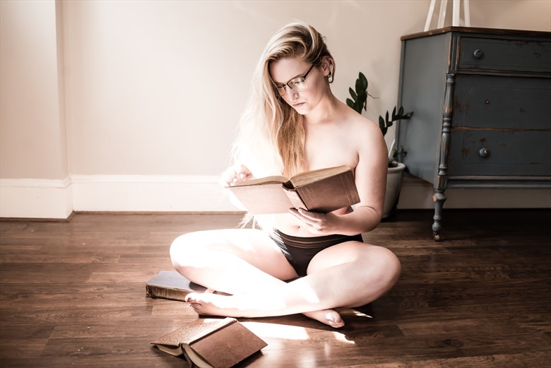 Bookworm Artistic Nude Photo by Photographer DaveMylesPhotography