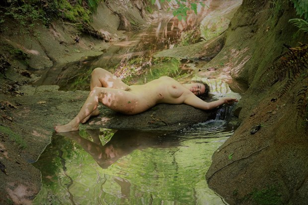 Laying on a rock Artistic Nude Photo by Photographer EnlightenedImagesNC