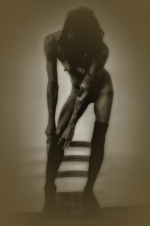 Putting my stockings on standing on a chair Artistic Nude Photo by Photographer dvan