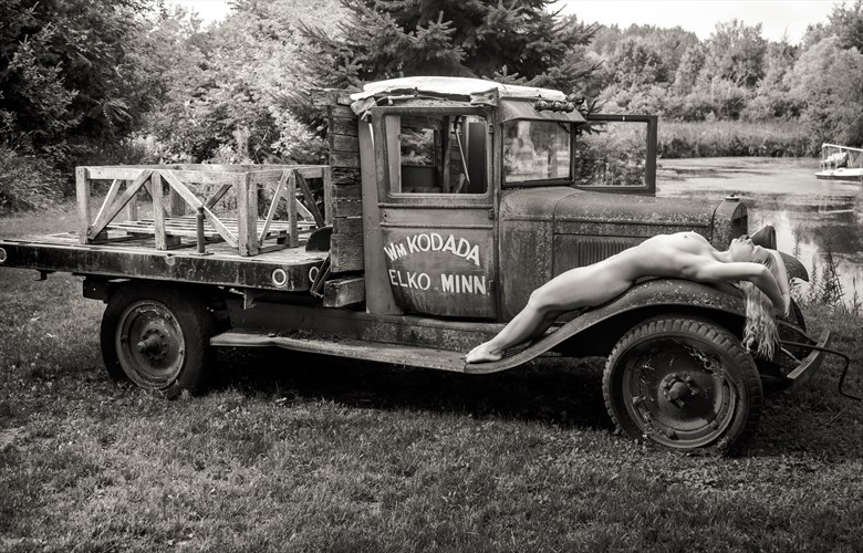 Reclining Nude on Antique Truck Artistic Nude Photo by Photographer Risen Phoenix
