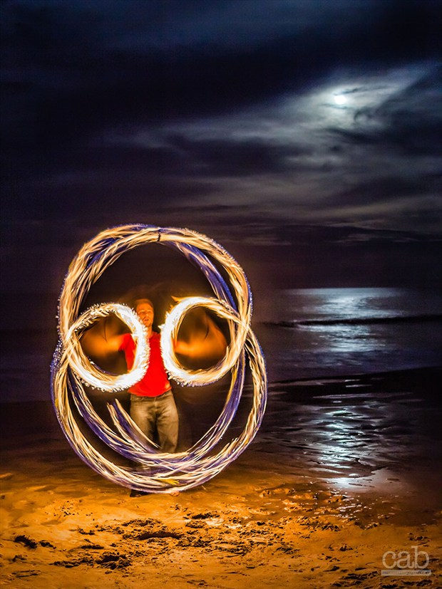 Spinning Under the Supermoon Nature Photo by Photographer cabridges