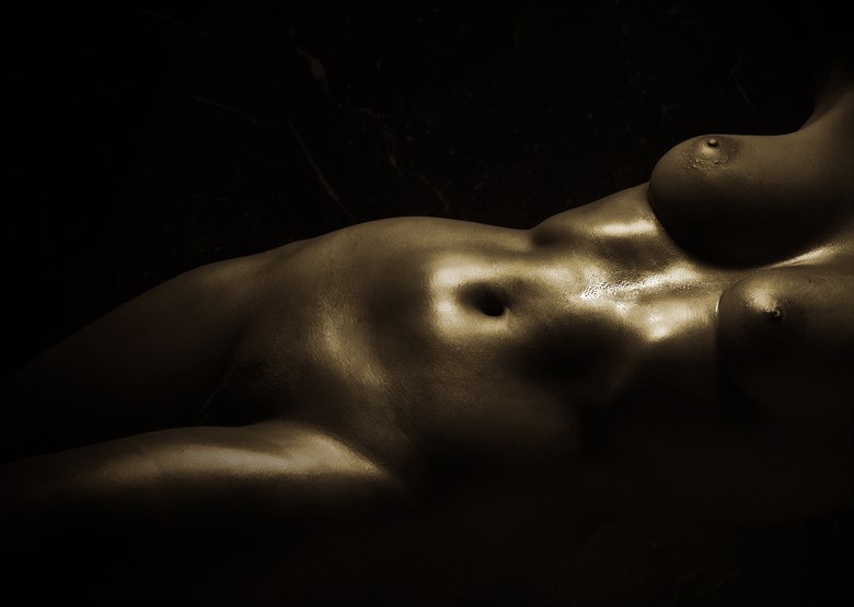 Torsoe Lying Artistic Nude Photo by Photographer Ray Kirby