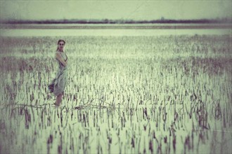 Woman in field in 87 seconds Nature Photo by Photographer Burntlight