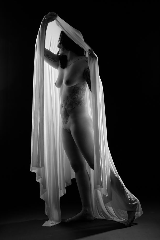 a white cloth erotic photo by photographer jens schmidt
