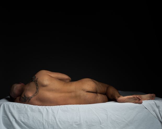 adam in bed artistic nude photo by photographer david clifton strawn