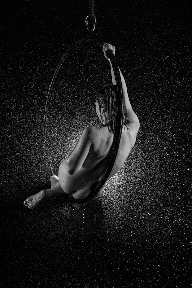 angi on a hoop in the rain artistic nude photo by photographer brian cann