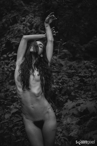 artistic nude nature photo by photographer burning paper hearts