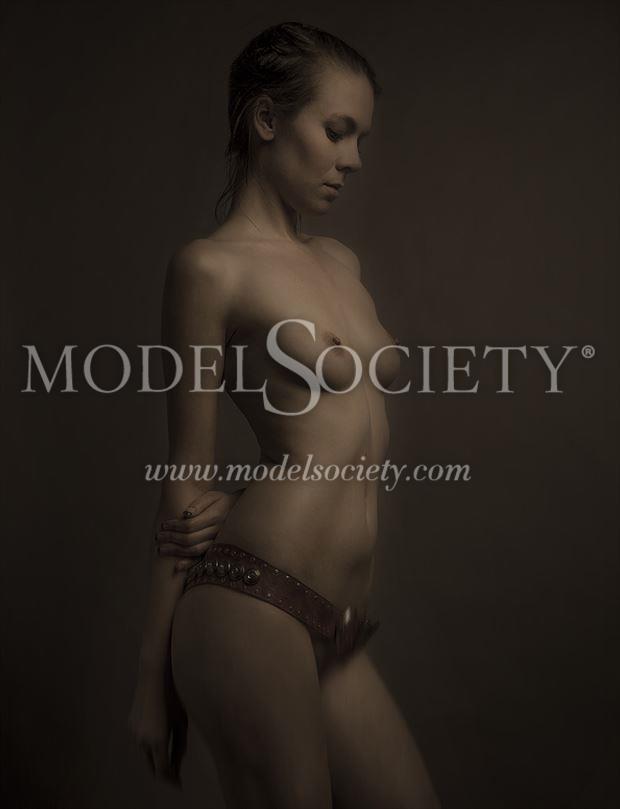 artistic nude studio lighting photo by photographer full bleed image