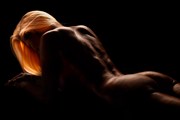 artistic nude studio lighting photo by photographer under black light