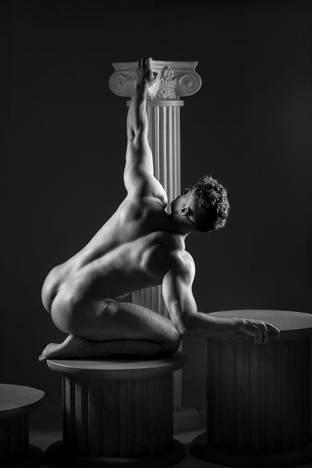 atlas reached artistic nude photo by photographer light shadow studio