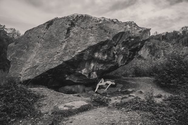 between a rock artistic nude photo by photographer neilh