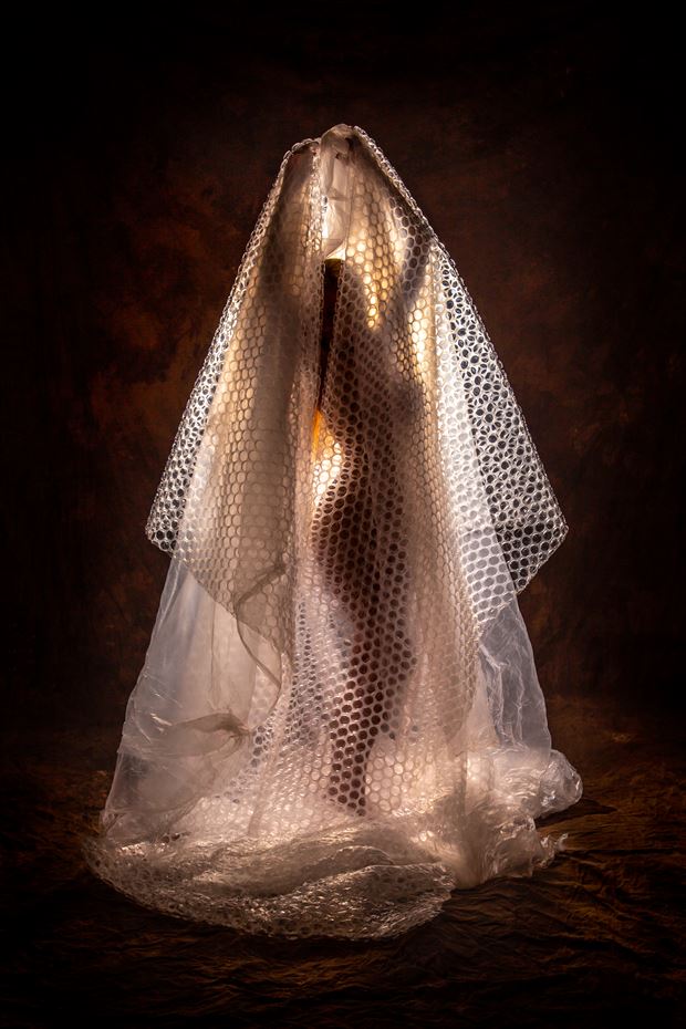 cocooned abstract photo by photographer under black light