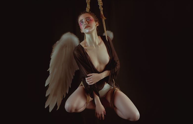cupid s regret surreal photo by model ahna green