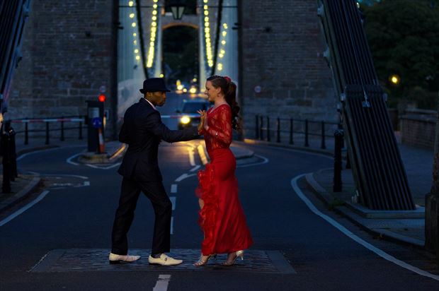 dancing upon the bridge stopping traffic sensual photo by model matriix