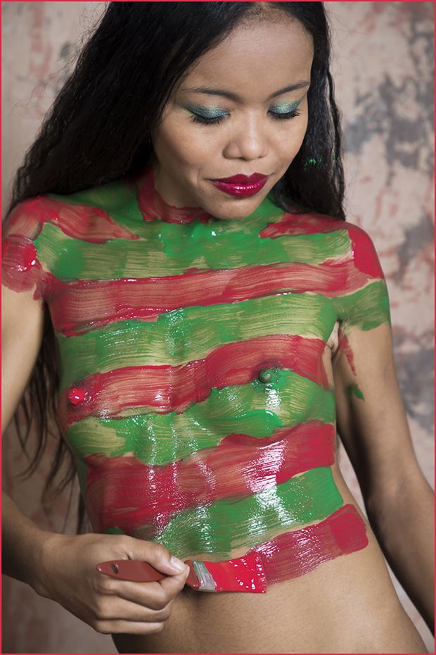 decorating herself for christmas artistic nude photo by photographer dpaphoto