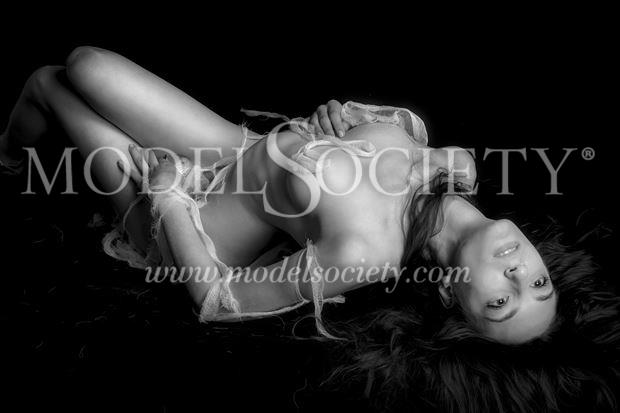 ella implies as she feels sensual photo by photographer eric delaforce