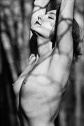 embracing the light artistic nude photo by model cali laine