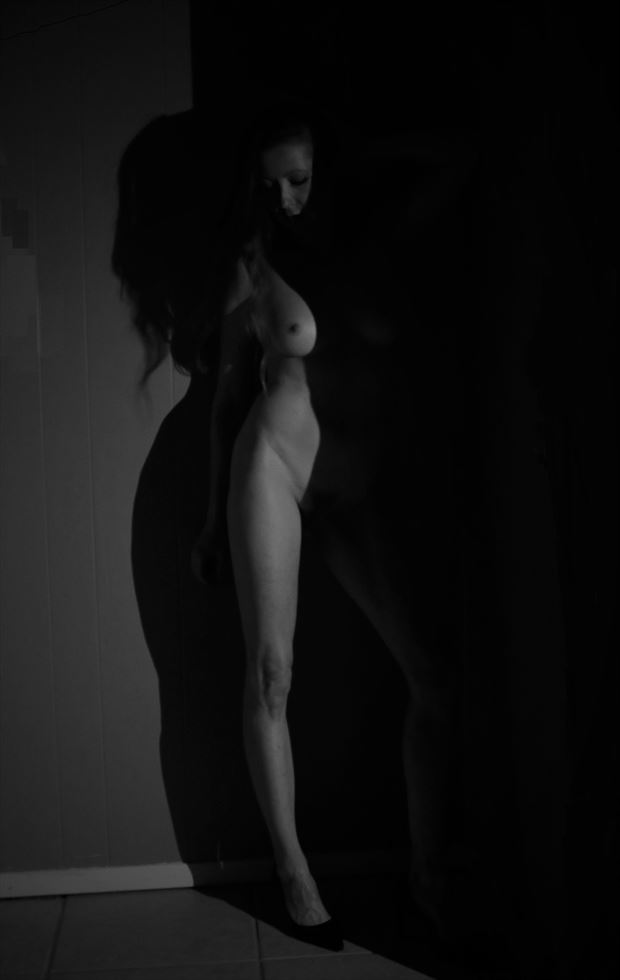 emerging from the darkness artistic nude photo by photographer comet photos