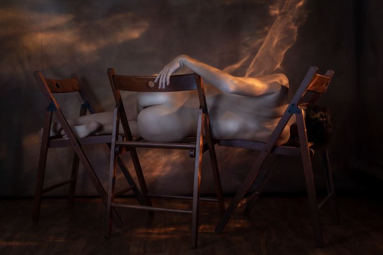 eva and the chairs artistic nude photo by photographer claude frenette