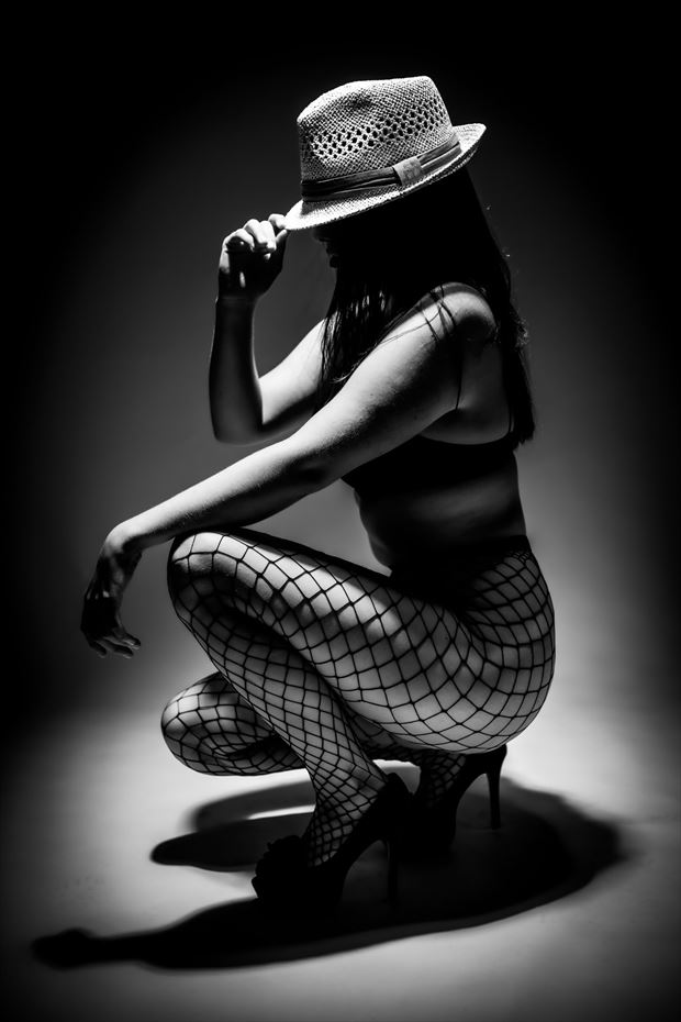 fishneted squat sensual artwork by photographer 27eins
