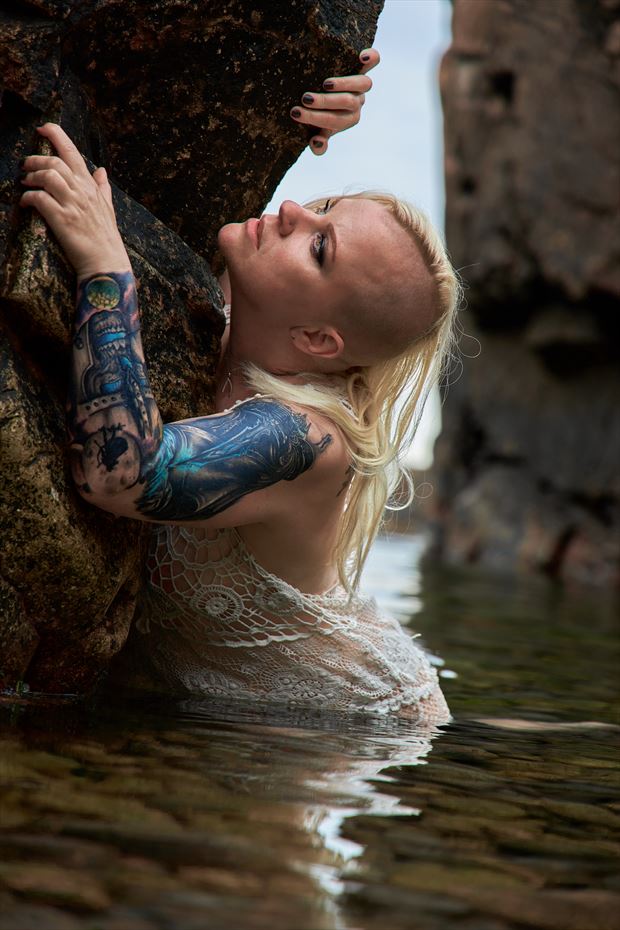 from water she rise tattoos photo by model trasselzudd