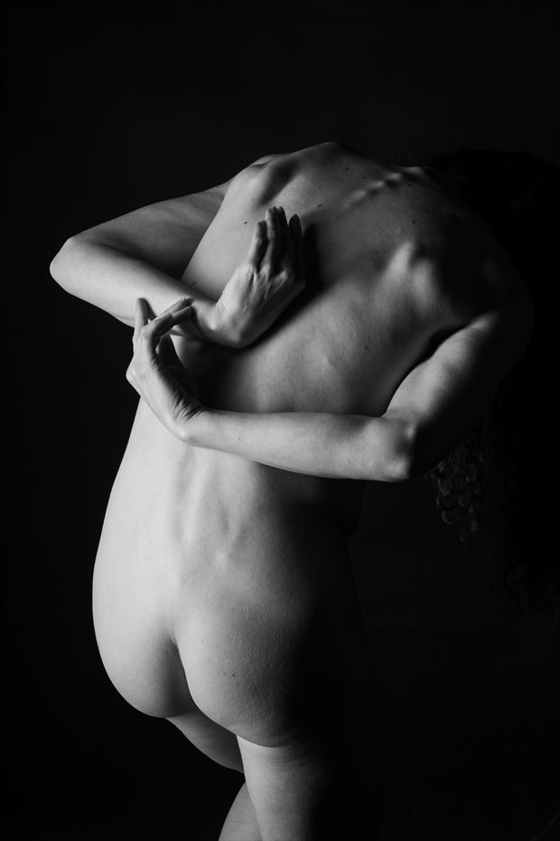 hands behind artistic nude artwork by photographer gsphotoguy