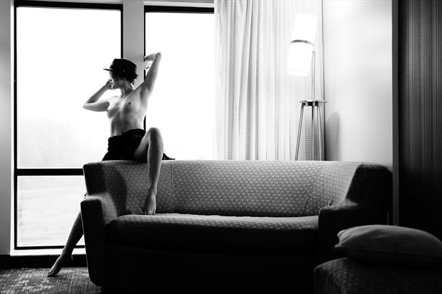 hotel lounging artistic nude photo by model lillia keane