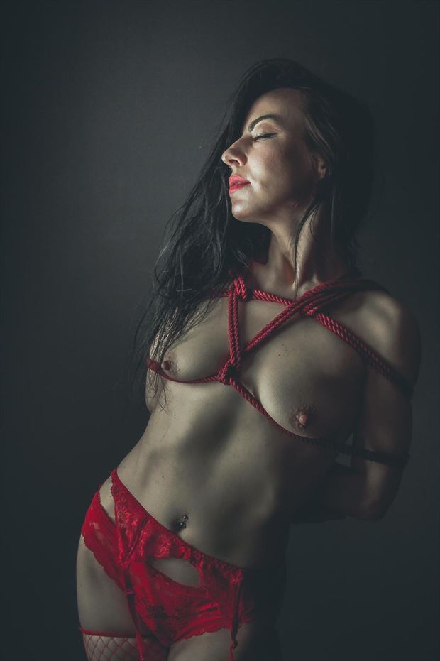 in red pop up shibari roped artistic nude photo by model blackswann_portfolio