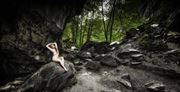 in the rocky haven below the trees their sits artistic nude artwork by photographer neilh