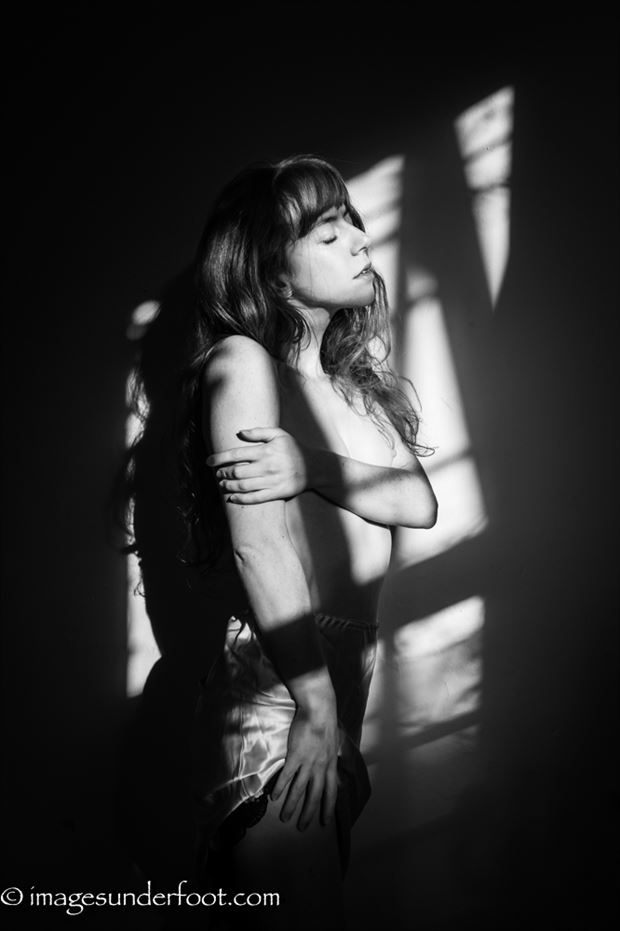 in the shadows artistic nude photo by photographer greg holden