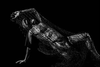 into the trap artistic nude photo by model avid light