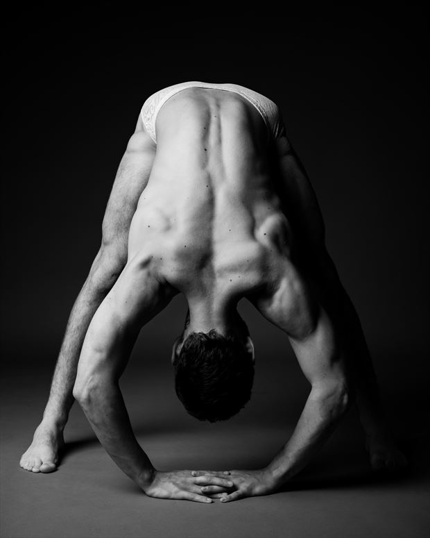 jacob stretching chiaroscuro photo by photographer david clifton strawn