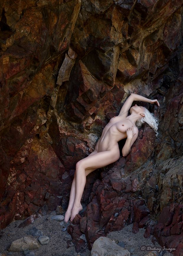 jagged rocks smooth form artistic nude photo by photographer deekay images