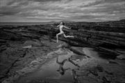 jumping the tide pool artistic nude photo by photographer randall hobbet