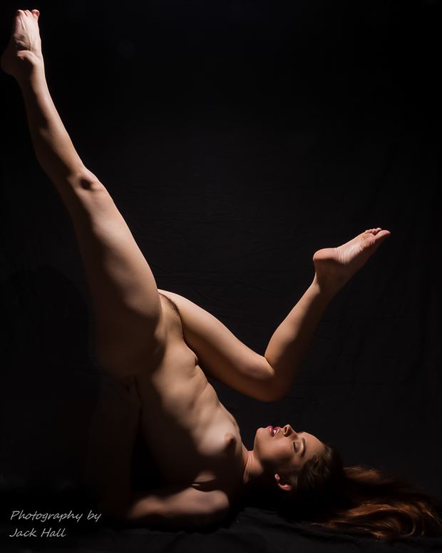 kind of stretched out artistic nude photo by photographer jack hall