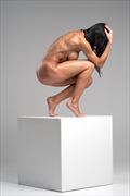 lady posing on the cube erotic photo by photographer oleg kamikaze