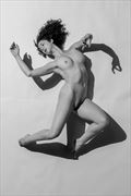 light and shadow artistic nude photo by model her stillness dances