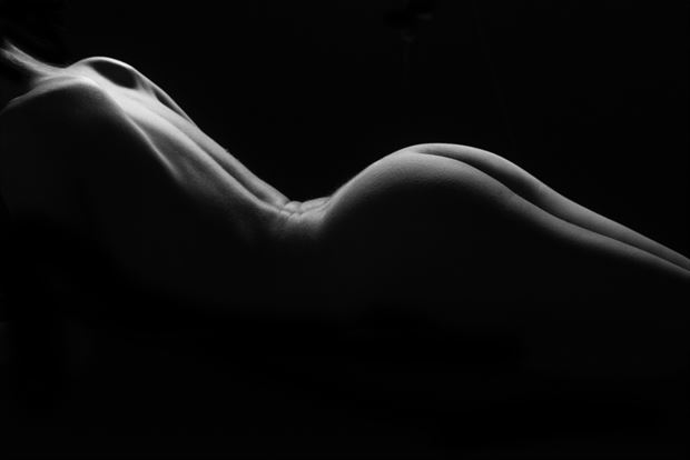 light sculpture lying figure artistic nude photo by photographer mark hickman