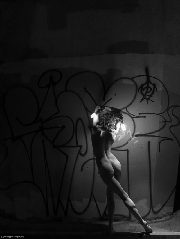 lit artistic nude photo by model fearra lacome