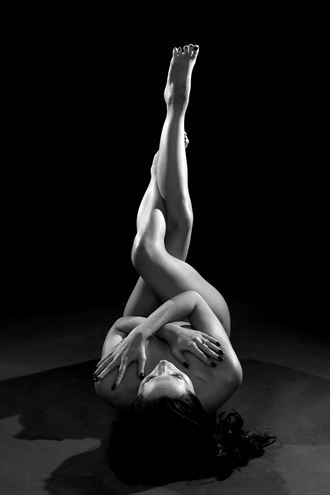 low key model with feet aloft artistic nude photo by photographer barleyfields
