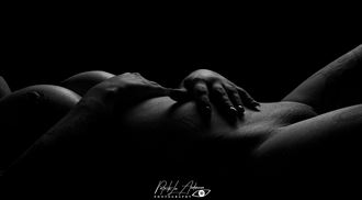 lying in the dark artistic nude artwork by photographer patrik andersson