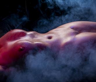 lying on a bed of smoke artistic nude artwork by photographer ian athersych
