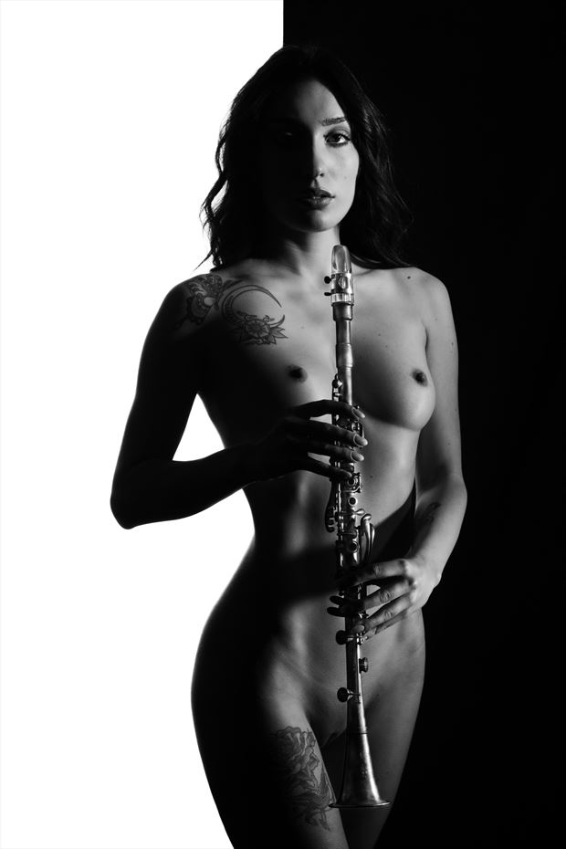 music in light clarinet artistic nude artwork by photographer antonello cirani