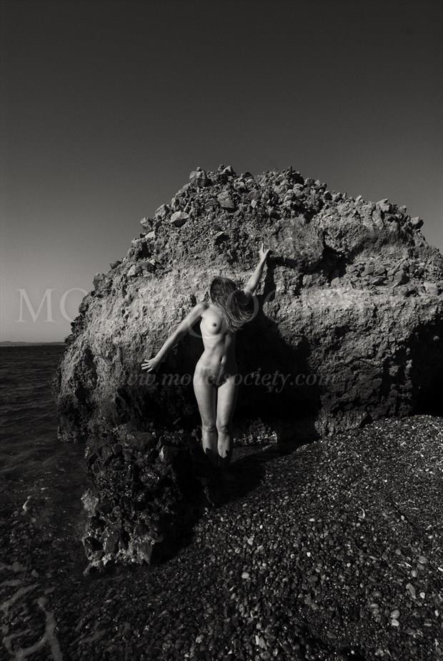 naked girl posing on the rock artistic nude photo by photographer manolis tsantakis