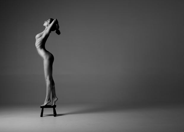 nude on a milk stool artistic nude photo by photographer richard benn