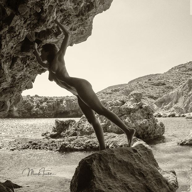 nude on the rocks artistic nude photo by photographer manolis tsantakis