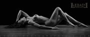 nude reclining on hardwood in silver shade artistic nude photo by photographer legacyphotographyllc