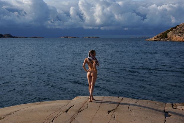nude under heavy clouds nature photo by photographer anders bildmakare