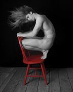 old red chair windblown artistic nude photo by photographer ebutterfieldphotog