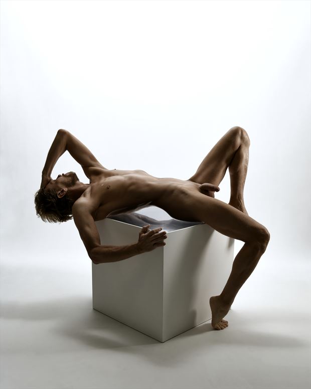 reclined on cube artistic nude photo by model robert p
